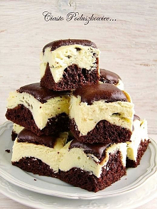 mniam...mniam...: ciasto poduszkowiec...
...poduszkowiec to wilgotne ciasto czekoladowe połączone z białym serem. Ciasto bardzo proste w przygotowaniu, robiłam je już wielokrotn...
