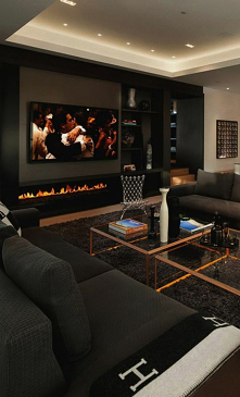 nowoczesny salon deco, telewizor ścienny, szara ściana, biały jasny sufit, szare sofy Umeblowanie nowoczesnego salonu nie jest łatwym zadaniem, ale tutaj dajemy ci kilka przydat...