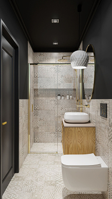 Łazienka glamour w szarych dekorach i czerni ze złotymi bateriami.