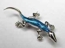 srebrna broszka jaszczurka