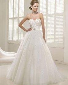 Jak dobrać suknie slubną do...