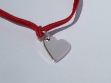 Serce... na rzemieniu dla... wyjątkowej osoby. 
Złota Linia