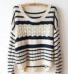 Czarno-biały sweterek ,pasujący do ciemnych jeansów lub jeginsów.<3