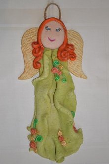 Anioł z masy solnej, duży w jesiennym klimacie, przechwycony przez siostrę :-)