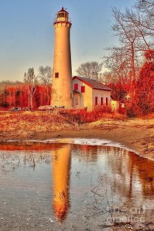 Sturgeon Point Lighthouse on the shore of Lake Huron in Michigan.