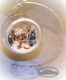 Zimowy świat zamknięty w bombce.
Klik w zdjęcie.