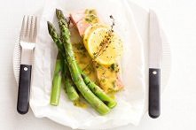 Baked salmon with lemon, thyme and asparagus