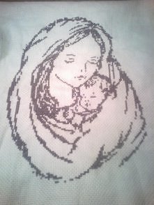 Wyszyty szarą muliną