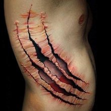 Tatuaż rozdarta skóra