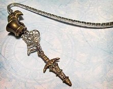 Filiżanka, kołowrotek i miecz Rumpeltiltskina.