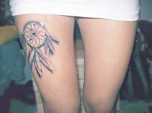 dreamcatcher thigh tattoo