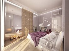 Stylowe wnętrze zaprojektowane z dbałością o detal. Na wprost łóżka znajduje się szafa z drzwiami przesuwnymi wykończonymi dekoracyjnym fornirem dębowym układanym w piramidki.