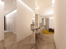 Po środku salonu zaprojektowany kubik z luster powiększa optycznie i doświetla wnętrze.