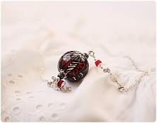 kulka na łańcuszku