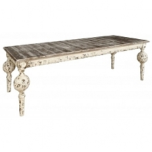 Długi stół z przecieraną farbą na podstawie oraz z bielonym blatem z serii Grigio.