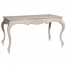 Rewelacyjny jasny stół z dekorem na podstawie, stojący na finezyjnych nogach.