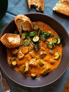 Roast the chopped zucchini with paprika, cumin and ground coriander – mashe a few the cooked veggies and smother it in a delicious curry sauce made with spices, tinned tomatoes ...