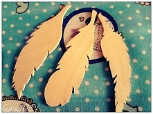 Piórka drewniane do dekoracji.