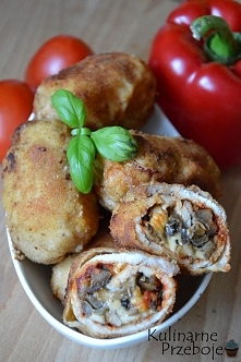 Roladki schabowe z pieczarkami i serem

Przepis po kliknięciu w zdjęcie ;)