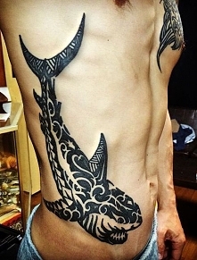 shark tattoo on ribs