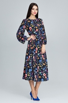 Zwiewna sukienka midi z marszczonym rękawem nada wyrazistości i kobiecości w każdej stylizacji. Talię podkreśla gumeczka w pasie.