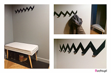 Przedpokój w stylu skandynawskim. Wieszak metalowy na ubrania od Bucha. Wieszak ZYGZAK